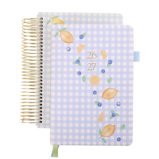 Planner with blue checkered cover and lemon design on a white background