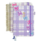 Plaid notebook with colorful bow designs on a white background