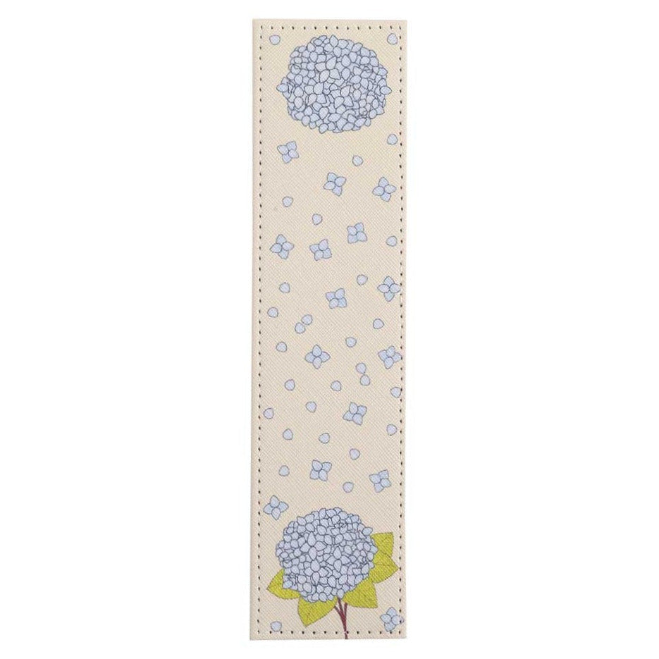 Floral patterned bookmark with blue flowers on a beige background