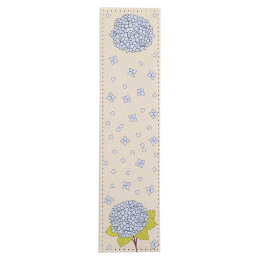Floral patterned bookmark with blue flowers on a beige background