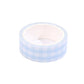 Roll of light blue washi tape on a white background