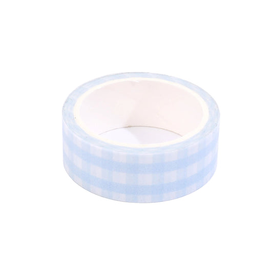 Roll of light blue washi tape on a white background