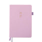 Pink planner with gold numbers on a white background